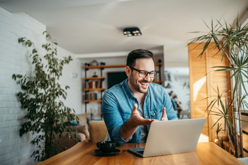 man working from home on laptop